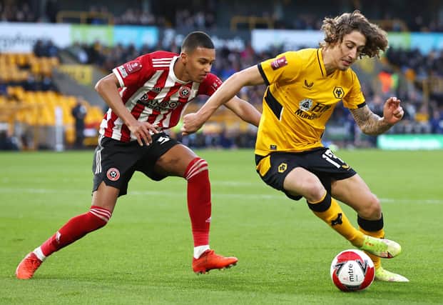 The defender was previously linked with Premier League clubs but is leaving Sheffield United upon the expiry of his contract.