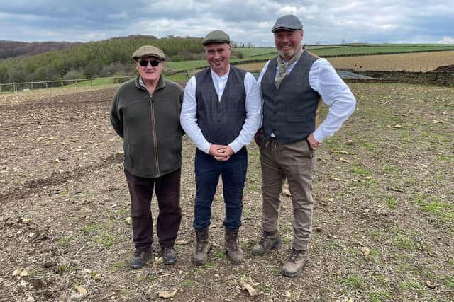 Rob Nicholson, Dave Nicholson and Roger Nicholson planting potatoes on Cannon Hall Farm