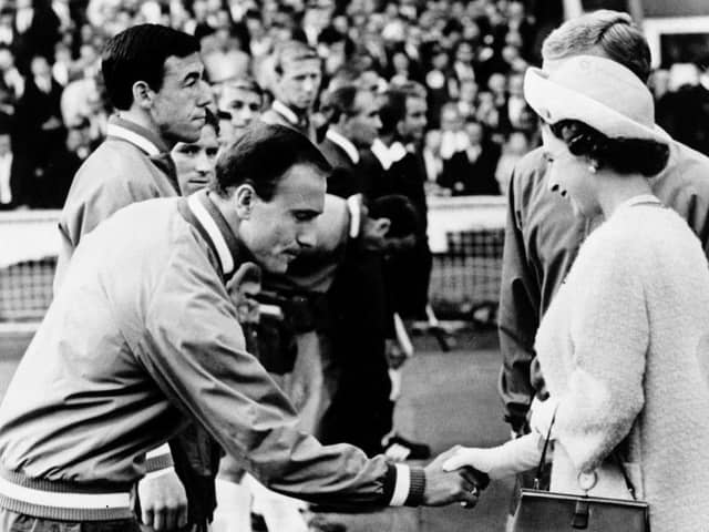 CROWNING GLORY: England right-back George Cohen meets Queen Elizabeth II before the start of the 1966 World Cup