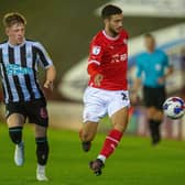 Ziyad Larkeche holds off Jay Turner-Cooke in Barnsley FC's EFL Trophy game with Newcastle U21. Picture: Bruce Rollinson