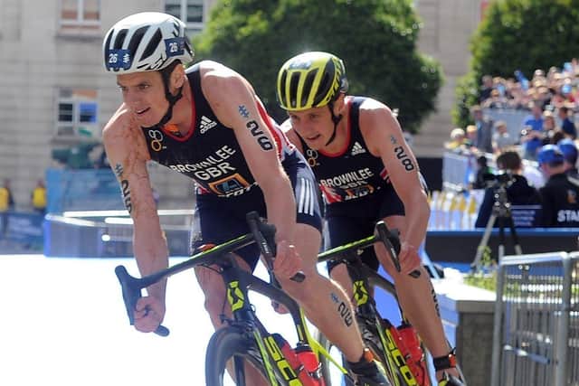 Follow me Bruv: Jonny Brownlee leads his brother Alistair on the bike in the Elite Mens Race through Millennium Square in 2017 (Picture: Tony Johnson)
