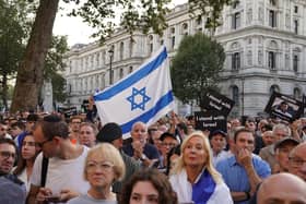 People attending a vigil outside Downing Street, central London, for victims and hostages of Hamas attacks. PIC: Lucy North/PA Wire