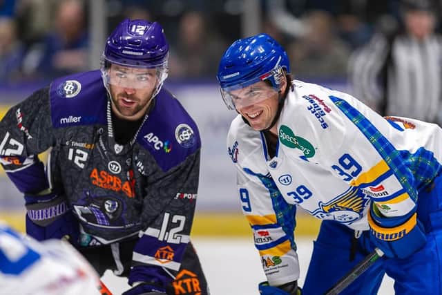 STICKING AROUND: Jordan Buesa (left), pictured in action for Glasgow Clan against Fife Flyers earlier this season. Picture:  Al Goold/EIHL Media.