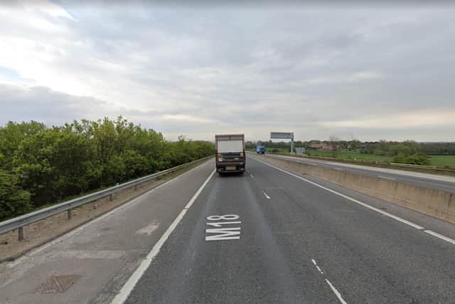 Part of the M18 is closed after a serious crash.
