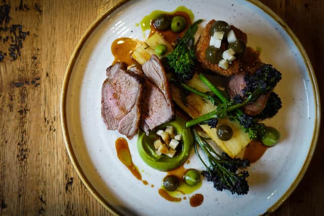 Roast lamb rump with broccoli puree, lamb belly fritter, caper ketchup, lamb fat pomme Anna, sprouting broccoli and pickled stalk with lamb jus