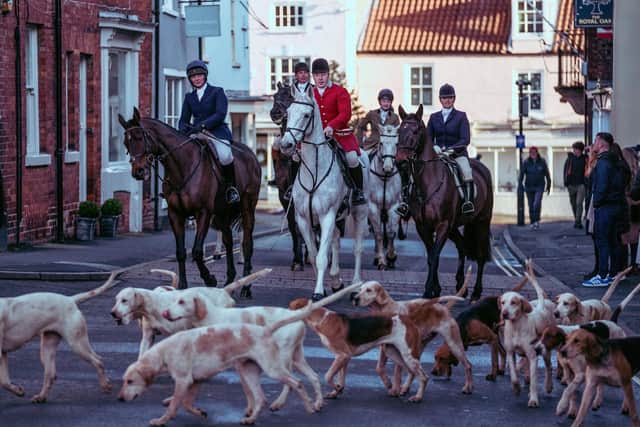 Picture Credit Charlotte Graham. The traditional Boxing Day Hunt, take place in Malton Market Square in North Yorkshire on Boxing day, the Middleton Hunt from Malton attend and Crowds gather in the Square with the Hounds.