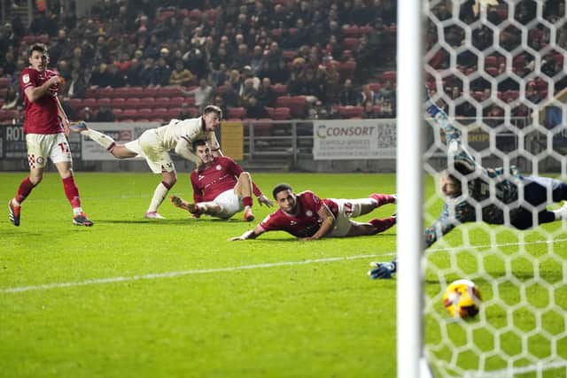 LATE STRIKE: Sheffield United's Harrison Burrows scores his team's winning goal to beat Bristol City 2-1 at Ashton Gate on Tuesday night. Picture: Nick Potts/PA