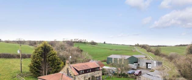 This privately situated residential smallholding is set in a sheltered location and has lovely views.