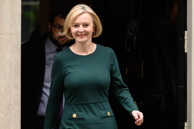 UK Prime Minister Liz Truss leaves number 10 Downing Street ahead of the weekly PMQ session on October 12, 2022 in London, England. (Photo by Leon Neal/Getty Images)