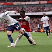 English superstars: James Maddison of Tottenham Hotspur is challenged by Bukayo Saka of Arsenal as they both produced top-class performances that makes Gareth Southgate's job even harder (Picture: Alex Pantling/Getty Images)