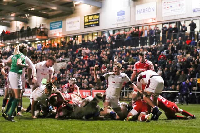 Alfie Bell of England celebrates after teammate Finn Theobald-Thomas scores a try during the Under-20 Six Nations match between England U20 and Wales U20 at Castle Park on February 25, 2022 in Doncaster, England. (Picture: George Wood/Getty Images)