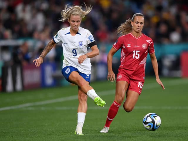 On the up: Rachel Daly of England, left, takes the ball past Frederikke Thogersen of Denmark during the Lionesses' 1-0 win in Sydney on Friday, a game that came at a cost for the European champions (Picture: Justin Setterfield/Getty Images)