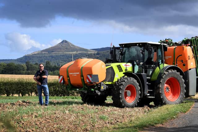 Alan is pictured with his dog Deedee on the farm with Roseberry Topping in the background.Picture taken by Yorkshire Post Photographer Simon Hulme