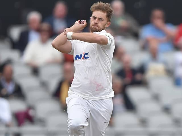 Ben Coad, pictured in action during last summer's Roses match at Old Trafford, has handed Yorkshire a big boost by signing a new contract extension. Photo by Nathan Stirk/Getty Images.