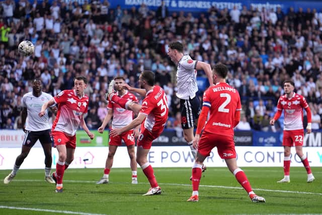 Bolton Wanderers' Eoin Toal heads home their second against Barnsley in the play-off semi-final second leg. The Reds conceded an alarming number of goals from set-pieces this season. (Picture: PA)