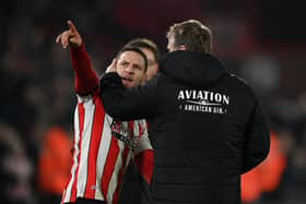 Billy Sharp of Sheffield United is spoken to by Phil Parkinson, Manager of Wrexham, after taunting fans of Wrexham following their side's defeat during the Emirates FA Cup Fourth Round Replay (Picture: Michael Regan/Getty Images)