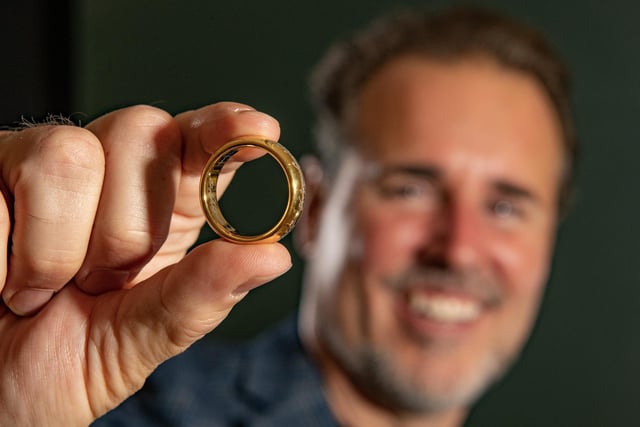 Curator Matt Fox with The One Ring at The Magic of Middle-Earth exhibition at  Experience Barnsley Museum & Discovery Centre, Town Hall in Barnsley photographed for the Yorkshire Post by Tony Johnson
