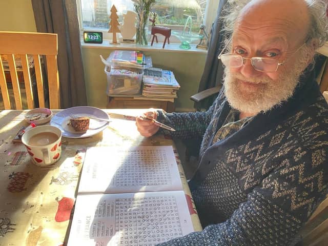 Ian Fellows during his retirement completing a crossword.