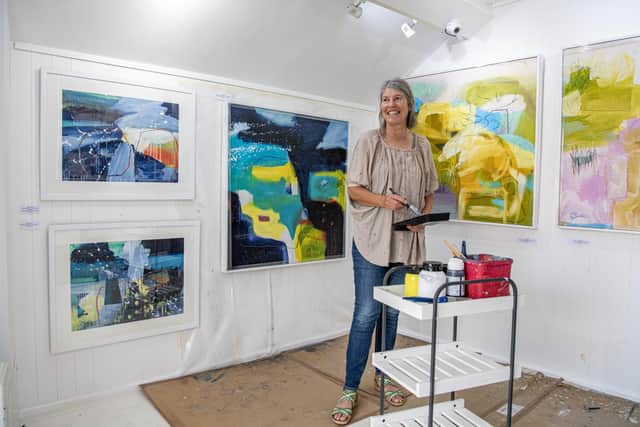 Artist Stef Mitchell in her Staithes Studio preparing for the Staithes Art Festival