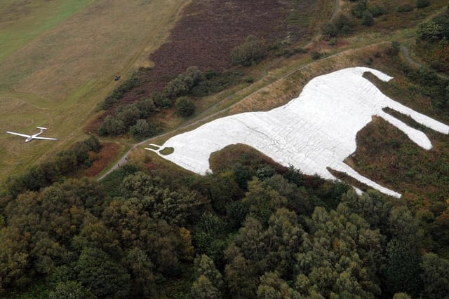 One of the most well known landmarks in the North York Moors National Park is the 314-foot turf cut Kilburn White Horse figure. The three-mile walk follows part of the Cleveland Way National Trail which takes you to the horse from the Sutton Bank National Park Centre. The view from Sutton Bank has been very popular with out-of-town visitors as well as locals.