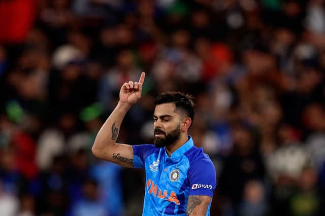 King Kohli. The brilliant India batsman pictured after his extraordinary innings at the MCG, which guided his team to a breathtaking victory over Pakistan at the T20 World Cup. Photo by Martin Keep/AFP via Getty Images).