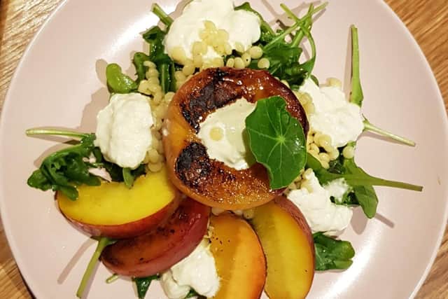 Grilled peach, cous cous and stracciatella salad