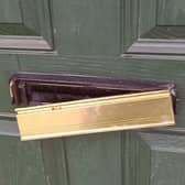 Damage to the letterbox at the house