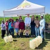 Representatives from the UK Agri-Tech Centre and GYO Systems, alongside project participants from Camperdown, KwaZulu-Natal, who will be working on the hydroponic element of the project.