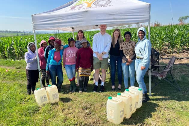Representatives from the UK Agri-Tech Centre and GYO Systems, alongside project participants from Camperdown, KwaZulu-Natal, who will be working on the hydroponic element of the project.