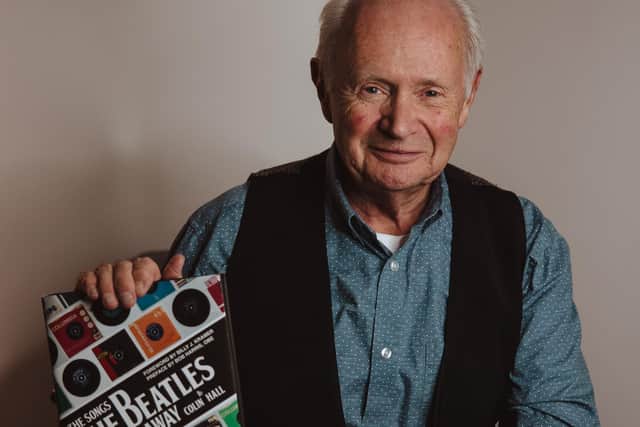Colin Hall with his new book on the Beatles
Picture: Toby Clark