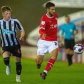 Ziyad Larkeche holds off Jay Turner-Cooke in Barnsley FC's EFL Trophy game with Newcastle U21s earlier this season. Picture: Bruce Rollinson