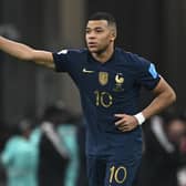 France's forward #10 Kylian Mbappe celebrates scoring his team's third goal during the Qatar 2022 World Cup final (Picture: PAUL ELLIS/AFP via Getty Images)