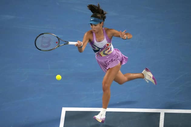 COMING HOME: Emma Raducanu plays a forehand return to rival Coco Gauff during their second round match at the Australian Open in Melbourne, the American coming out on top in straight sets to go through to round three 
AP/Aaron Favila