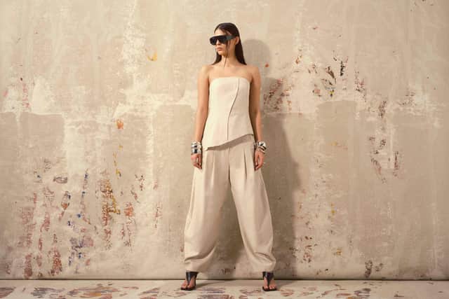 Topshop co ord raw hem barrel leg tailored trouser in stone, £50, and co ord asymmetric raw hem bandeau in stone, £46. At John Lewis.