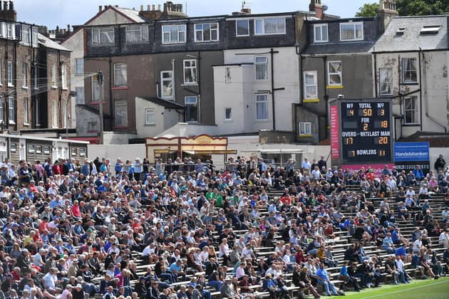 The heart and soul of county cricket: spectators watch a day of Championship action at North Marine Road, Scarborough. Picture by Simon Wilkinson/SWpix.com