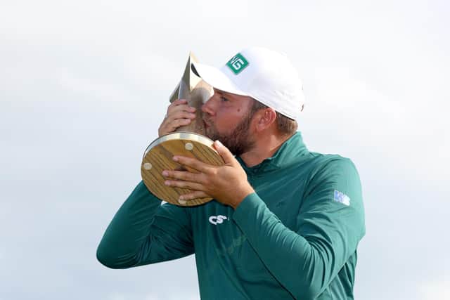 Dan Brown of England poses with the trophy after winning the ISPS HANDA World Invitational presented by AVIV Clinics 2023 on Day Four of the ISPS HANDA World Invitational presented by AVIV Clinics at Galgorm Castle Golf Club (Picture: Andrew Redington/Getty Images)