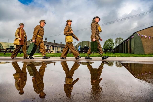 Pictured (left to right) Kathryn Sparkes, Michael Sparkes, Alison Keeling, and Rick Keeling, dressed as ATS and BEF Infantry personnel collecting supplies on site. Picture By Yorkshire Post Photographer,  James Hardisty
