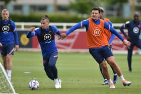 TO TAKE OR NOT TO TAKE: Former Leeds United midfielder Kalvin Phillips (left) and Manchester United defender Harry Maguire would both be risky choices for England's World Cup squad - but ones worth taking. Picture: Nathan Stirk/Getty Images