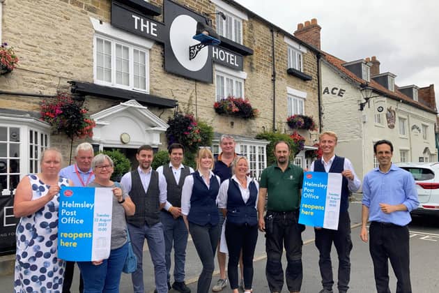 Members of The Inn Collection Group, Post Office representatives and Councillor Jabbour outside the Black Swan Hotel, where the new Post Office service in Helmsley will be located