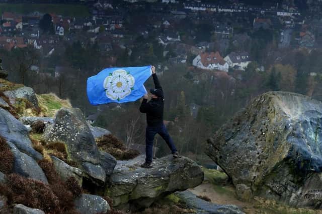 The Yorkshire Flag is raised at the Cow and Calf Rocks, Ilkley. (Pic credit: Simon Hulme)