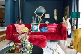 The bright pink sofas are from Sofology and many of the accessories are from Luxeology.