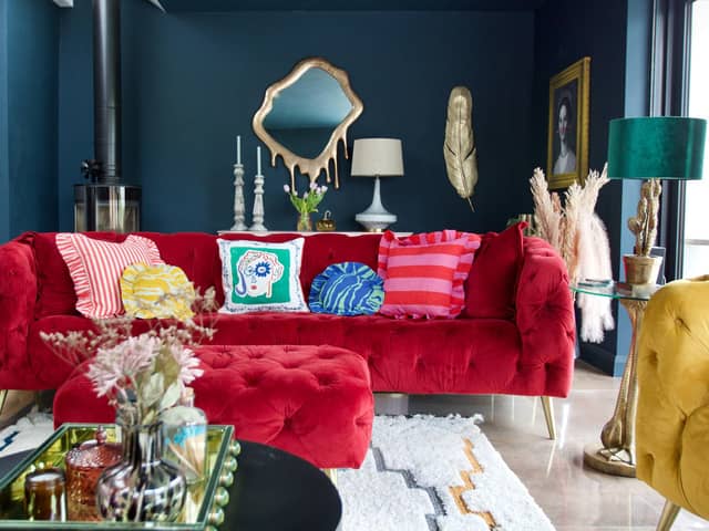 The bright pink sofas are from Sofology and many of the accessories are from Luxeology.