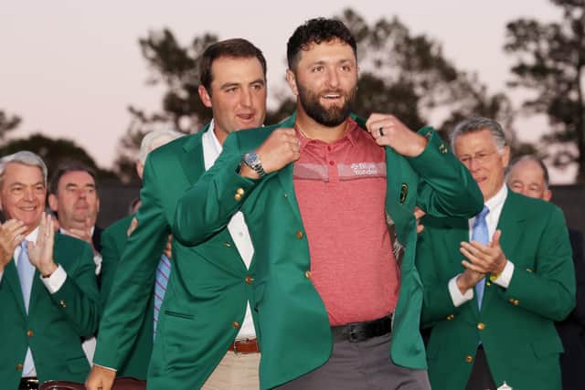 The men to beat: Jon Rahm of Spain is awarded the Green Jacket by 2022 Masters champion Scottie Scheffler of the United States (Picture: Christian Petersen/Getty Images)