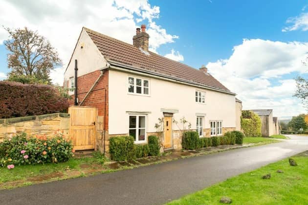 The property is a quintessential country cottage with lots of character and perioid features