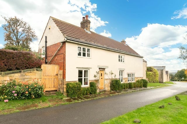 The property is a quintessential country cottage with lots of character and perioid features