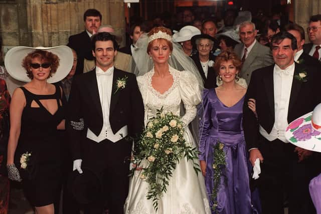 Raquel Welch, far left, and Fred Trueman, far right, are pictured at the wedding blessing of Damon and Rebecca. Holding Fred's arm is his daughter, Sheenagh. PA photo by John Giles.