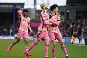 Leeds United's Patrick Bamford (centre) celebrates scoring their side's second goal of the game during the Emirates FA Cup Third Round match at the Weston Homes Stadium, Peterborough. Picture: Joe Giddens/PA Wire.