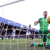 LONDON, ENGLAND - JANUARY 28: (EDITORS NOTE: In this photo taken from a remote camera from behind the goal.) Lee Nicholls of Huddersfield Town reacts after failing to save the shot of Kenneth Paal of Queens Park Rangers which results in their first goal during the Sky Bet Championship match between Queens Park Rangers and Huddersfield Town at Loftus Road on January 28, 2024 in London, England. (Photo by Richard Pelham/Getty Images)