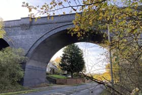 The viaduct passing over the road beneath