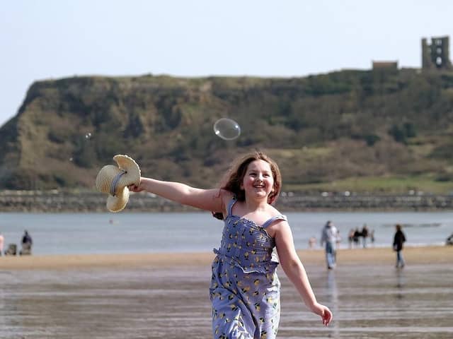 A young girl enjoys Scarborough beach in the sunshine. (Pic credit: Richard Ponter)